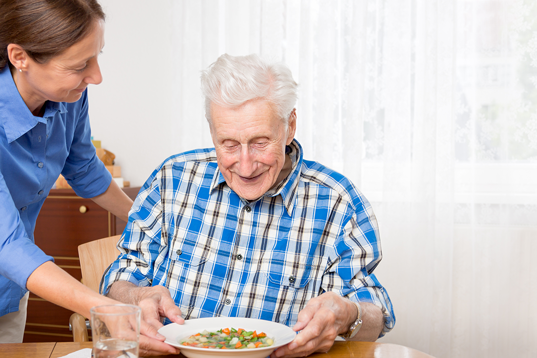 Man Being Served a Meal